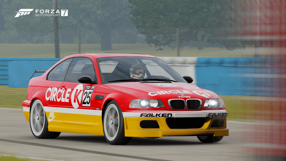 A BMW in red and yellow Circle K themed racing livery.