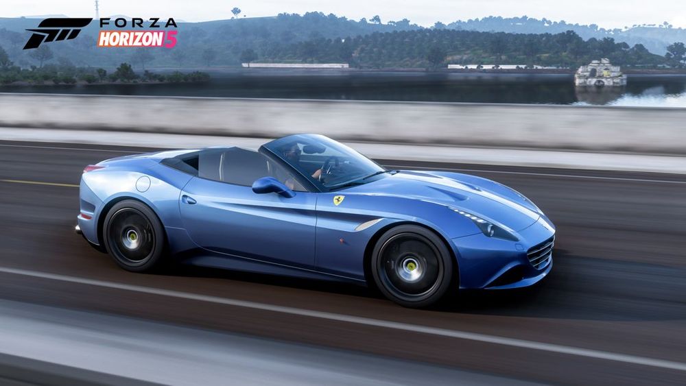 Ferrari California T driving down the highway.