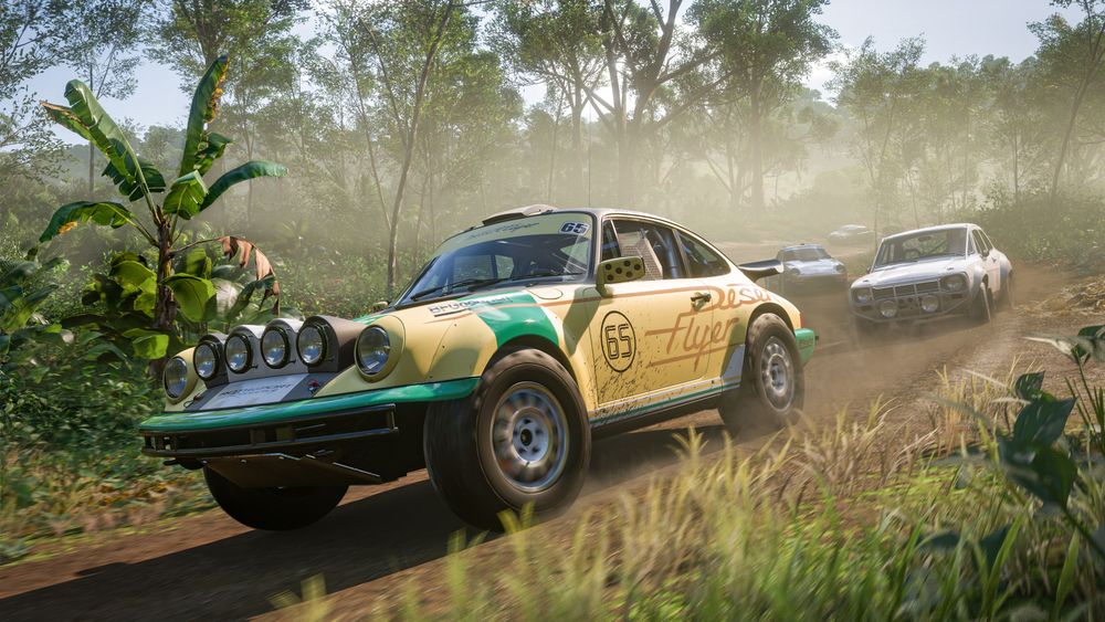 A Porsche 911 Sahara races on a dirt road in Horizon Mexico.