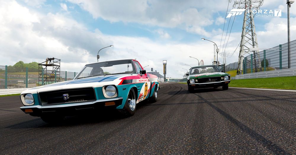 Two racing utes on the track