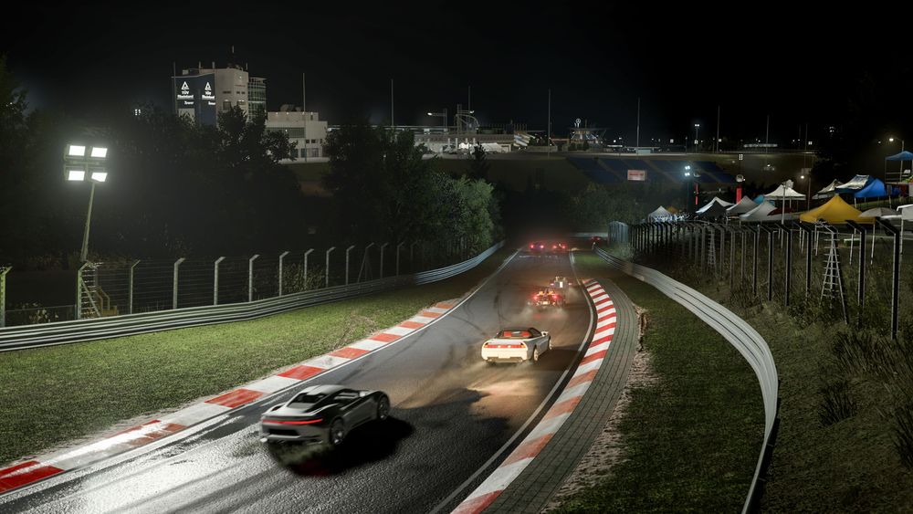 Nordschleife at nigh with four racers takinga a lap on it