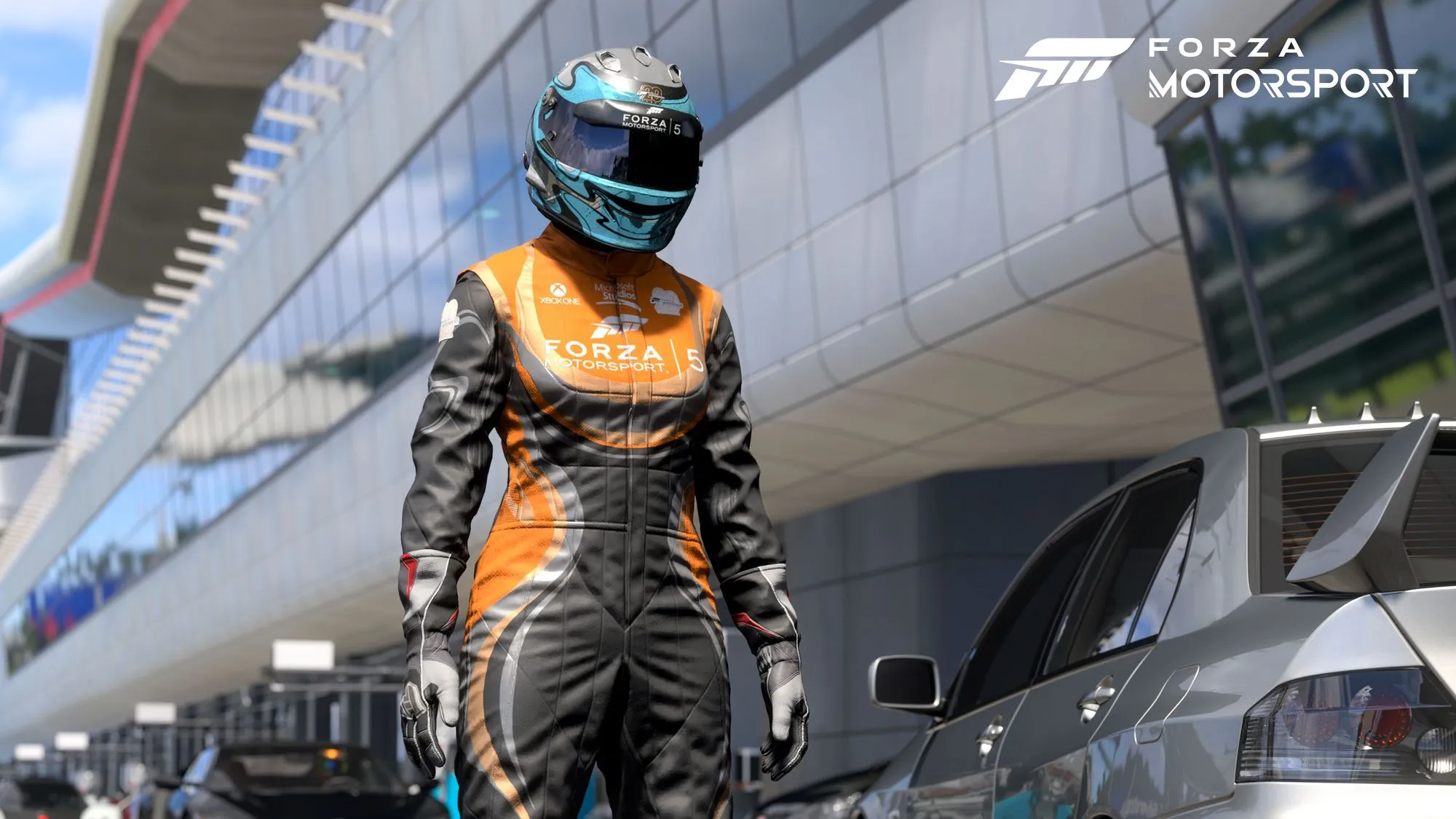 https://cdn.forza.net/strapi-uploads/assets/massive_Driver_Suit_FM_5_MIT_Lancer_Evo_IXMR_06_Silverstone_01_16x9_3840x2160_WM_e45b707d99.webp