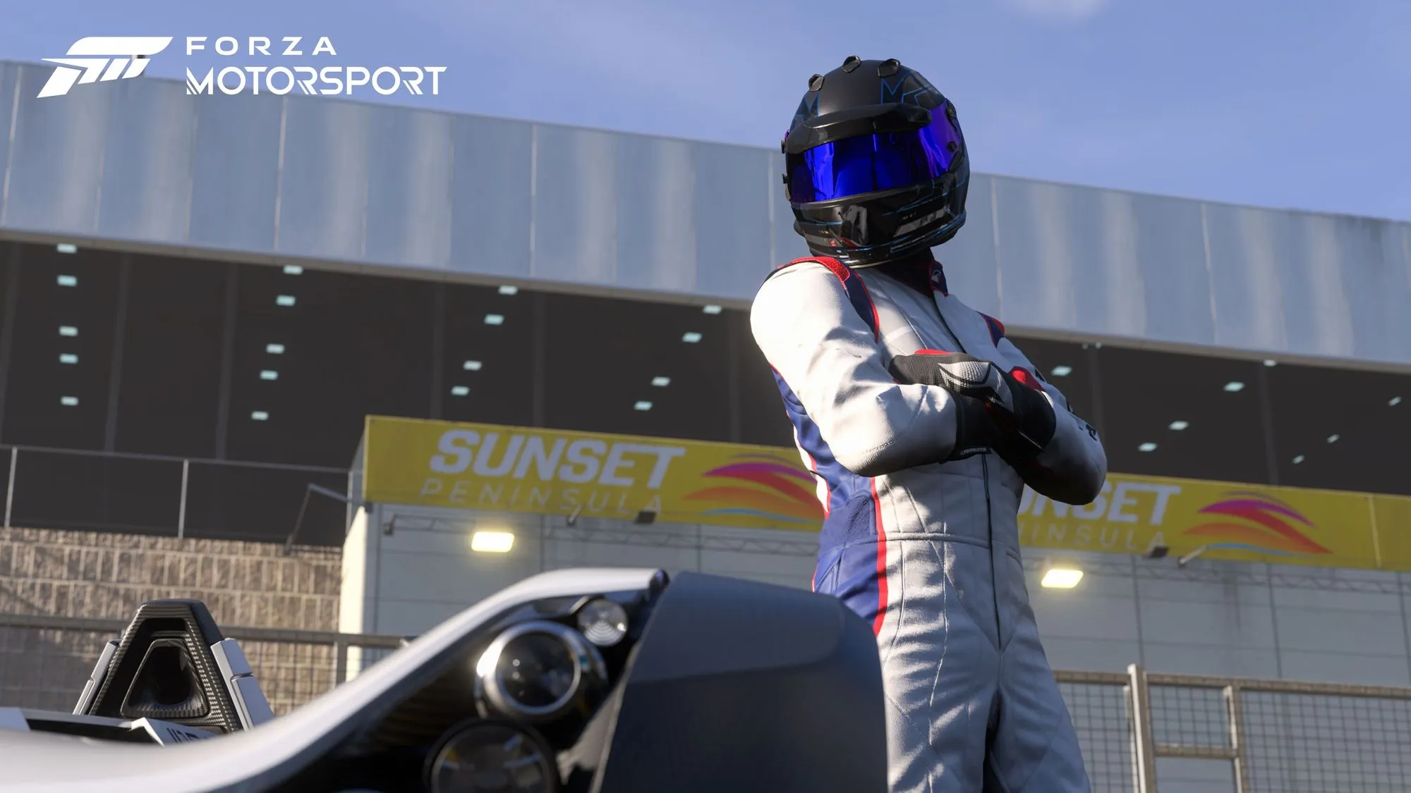 https://cdn.forza.net/strapi-uploads/assets/massive_Forza_Motorsport_Driver_Suit_Weekend_Warrior_Female_BAC_Mono_14_Sunset_Peninsula_16x9_WM_b2fc9cec92.webp