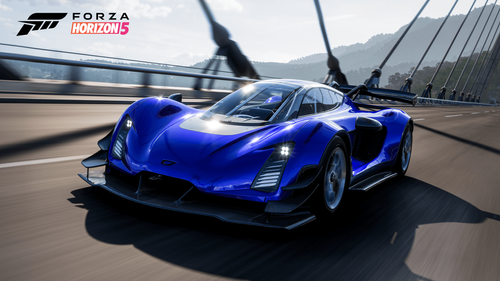 Blue Czinger sports car driving on a bridge