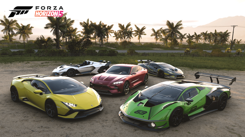 A group of Lamborghinis parked next to each other during the sunset in front of some palm trees