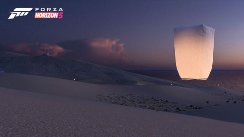 Floating lanterns in the sand desert celebrate Lunar New Year.