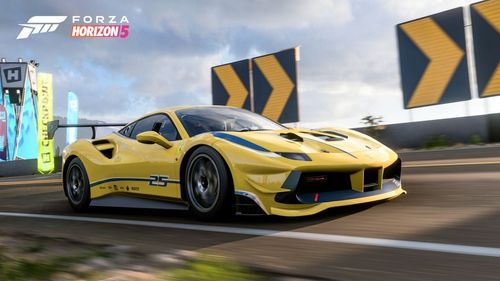 Yellow Ferrari Corse Clienti 488 Challenge on the racetrack.