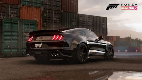 Ford DeBerti Mustang GT behind container units