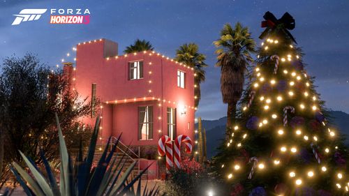 Festive trees, lights and decorations at the red multi-story Player House in Casa Bella.