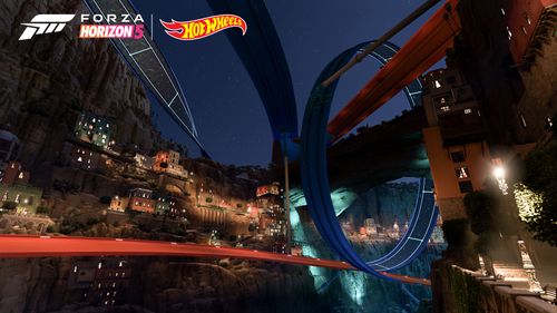 Orange and blue Hot Wheels tracks wraps around the Giant's Canyon desert biome.