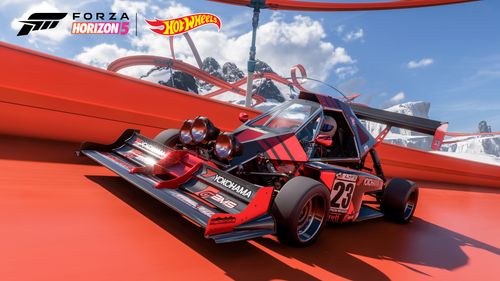 The red and black 2020 SIERRA Cars #23 Yokohama ALPHA drives on orange Hot Wheels track.