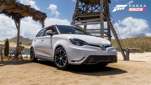 A white MG MG3 parked on a beach.