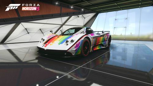 Race car with a colorful Pride themed livery.