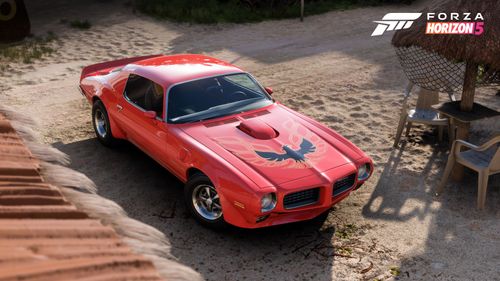 Pontiac Firebird TransAm SD455 on a dirt road