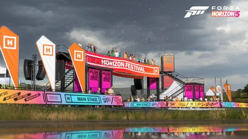 The colorful Horizon Festival UK entrance as dark, gloomy clouds approach.