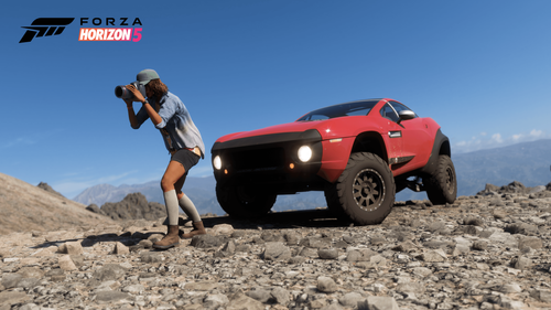 Male character standing in front of a vehicle taking a picture