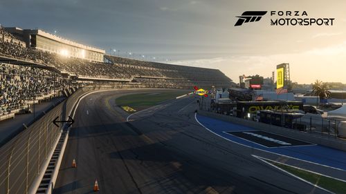Daytona track at sunset with a roaring crowd