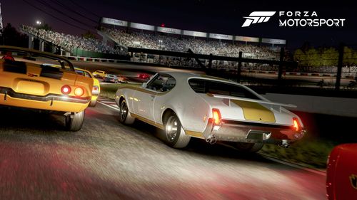 Night race at Suzuka featuring a variety of muscle cars in different colors from AMC, Buick, Chevrolet, Chrysler, Dodge and others.
