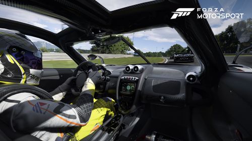 Interior view of a car with driver.